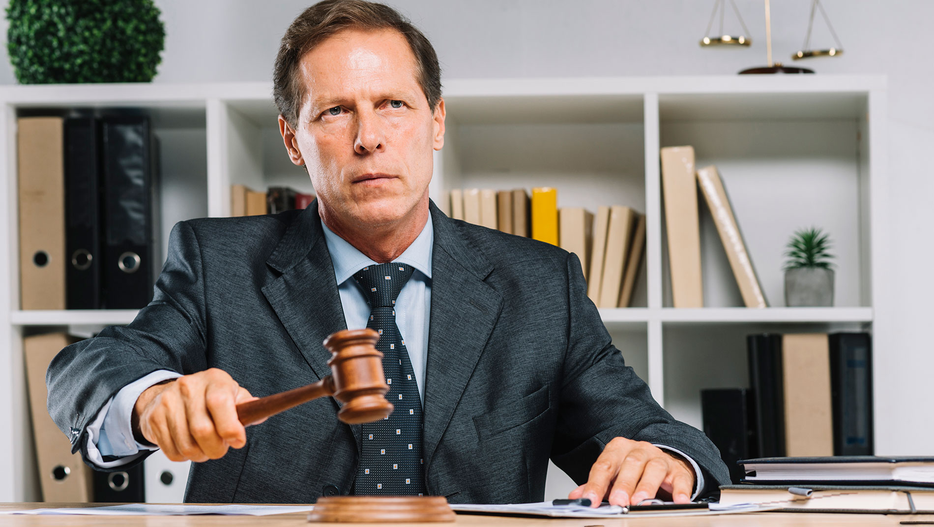 Attorney at his desk with a gavel
